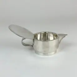 J. G. Galand Art Deco laikotarpio sidabruoto metalo arbatinukas 300 ml 10×16,5×8 cm