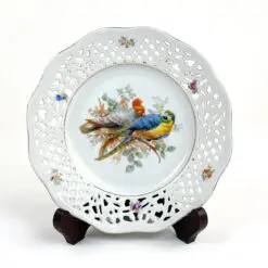 Vokiška porcelianinė Porzellanfabrik Carl Schumann GmbH & Co. ažūrinė lėkštutė su papūgų atvaizdu 19,5x19,5x3 cm