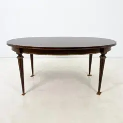 Ovalus išskleidžiamas raudonmedžio valgomojo stalas su žalvario apdailomis 106x171(+60)x77,5 cm