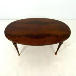 Ovalus išskleidžiamas raudonmedžio valgomojo stalas su žalvario apdailomis 106×171(+60)x77,5 cm