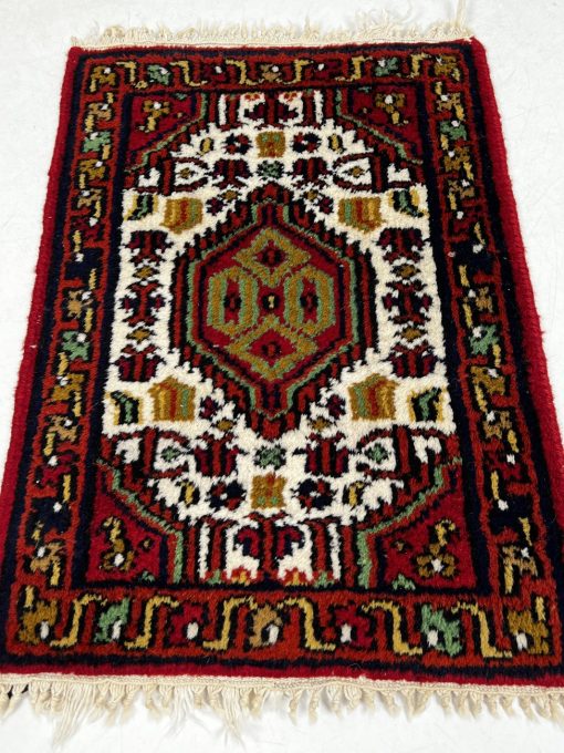 Vilnonis rankų darbo kilimėlis 45×63 cm