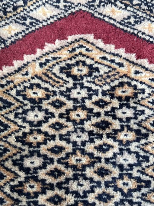 Rankų darbo vilnonis kilimėlis 30×61 cm