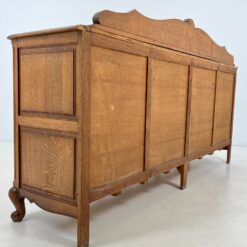 Ąžuolinė drožinėta keturių durų ir dviejų stalčių komoda 56x218x119 cm