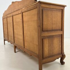 Ąžuolinė drožinėta keturių durų ir dviejų stalčių komoda 56x218x119 cm