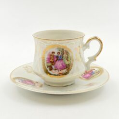 Porcelianinis “Krone Porzellan” puodelis (170 ml) 7x10x6,5 cm su lėkštute 13x13x2 cm