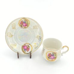Porcelianinis “Krone Porzellan” puodelis (170 ml) 7x10x6,5 cm su lėkštute 13x13x2 cm