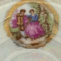 Porcelianinis “Krone Porzellan” puodelis (170 ml) 7x10x6,5 cm su lėkštute 13x13x2 cm