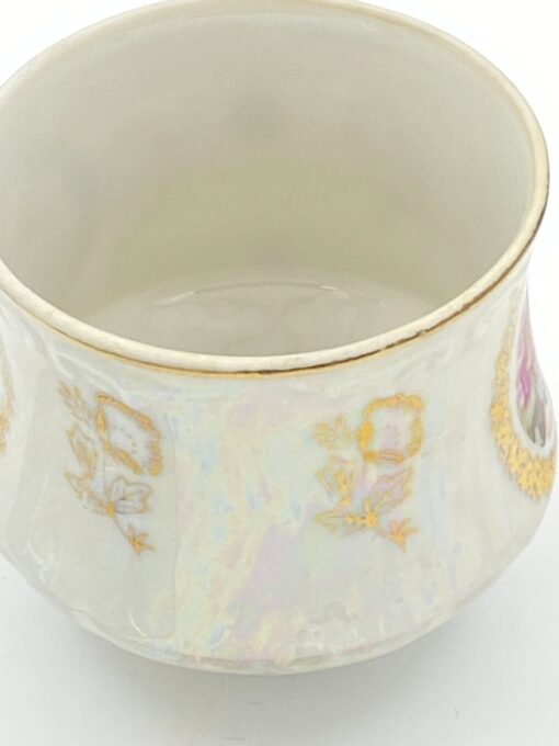 Porcelianinis “Krone Porzellan” puodelis (170 ml) 7x10x6,5 cm su lėkštute 13x13x2 cm