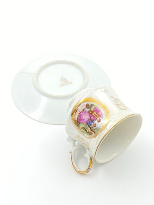 Porcelianinis “Krone Porzellan” puodelis (170 ml) 7x10x6,5 cm su lėkštute 13x13x2 cm