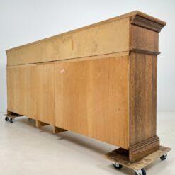 Ąžuolinė ilga keturių durų ir devynių stalčių komoda 60x271x116 cm