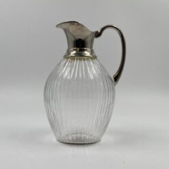Vintažinis stiklinis ąsotis su metalu 15x17x24,5 cm
