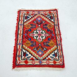 Persiškas rankų darbo vilnonis kilimėlis 65x39x1cm