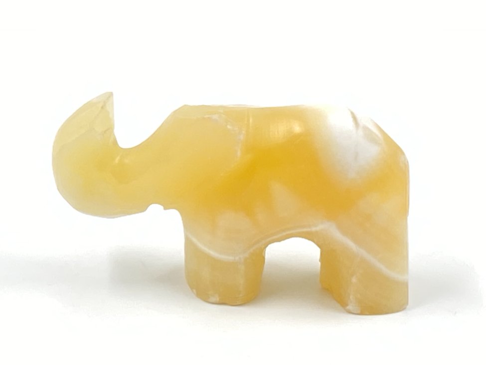 E0950-kitokios-skulpturos-1 Akmeninė drambliuko statula 2x8x5,5 cm