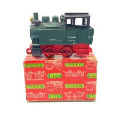 Vintažinis Lehmann LGB 2 dalių rinkinys: lokomotyvas 99 5001 su dėžute 12,5x24x15 cm ir 300 mm 10000×12 vnt. tiesūs bėgiai su dėžute 10,5x36x13,5 cm