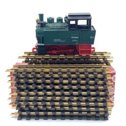 Vintažinis Lehmann LGB 2 dalių rinkinys: lokomotyvas 99 5001 su dėžute 12,5x24x15 cm ir 300 mm 10000×12 vnt. tiesūs bėgiai su dėžute 10,5x36x13,5 cm