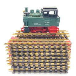 Vintažinis Lehmann LGB 2 dalių rinkinys: lokomotyvas 99 5001 su dėžute 12,5x24x15 cm ir 300 mm 10000×12 vnt. tiesūs bėgiai su dėžute 10,5x36x13,5 cm