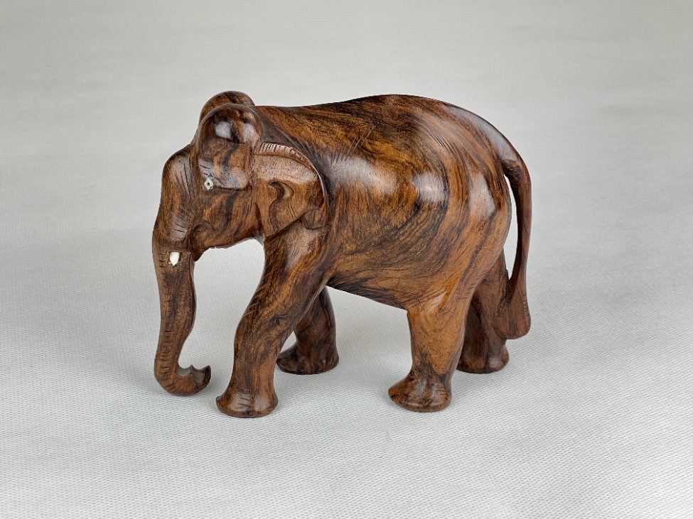 HN0097-kitokios-skulpturos-2 Medinė dramblio statula 7x14x11 cm