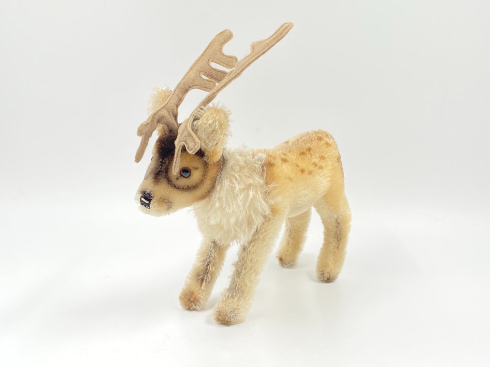 HN0411-zaislai-2 Vintažinis “Steiff” pliušinis elnias 28x9x24 cm