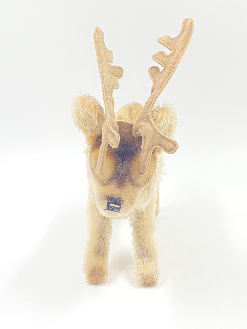 HN0411-zaislai-3 Vintažinis “Steiff” pliušinis elnias 28x9x24 cm