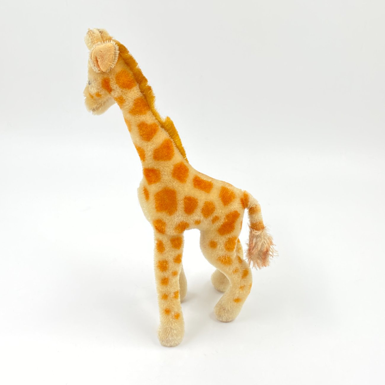 HN0412-zaislai-0 Vintažinė “Steiff” pliušinė žirafa 10x18x28 cm