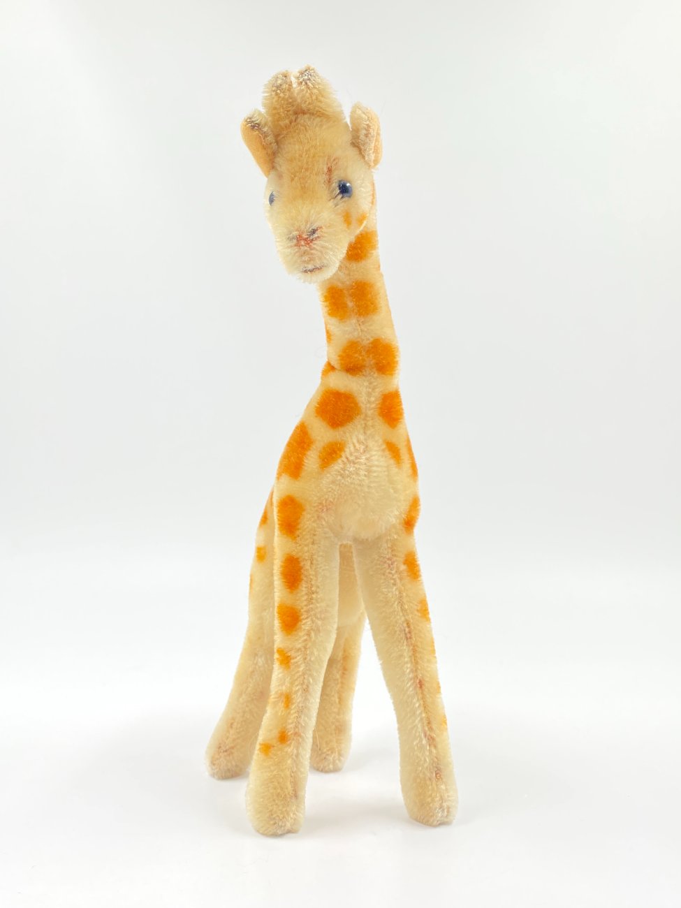 HN0412-zaislai-3 Vintažinė “Steiff” pliušinė žirafa 10x18x28 cm