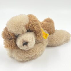 Vintažinis “Steiff” pliušinis gulintis šuo 5610/18 11,5x24x10 cm