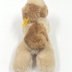 Vintažinis “Steiff” pliušinis gulintis šuo 5610/18 11,5x24x10 cm