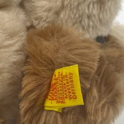 Vintažinis “Steiff” pliušinis gulintis šuo 5610/18 11,5x24x10 cm