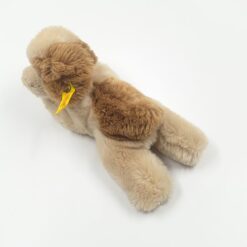 Vintažinis “Steiff” pliušinis gulintis šuo 5610/18 11,5x24x10 cm
