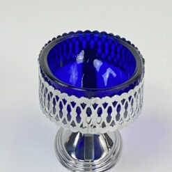 Ovalus mėlyno stiklo indas metaliniame stove 8×12,5×7,5 cm