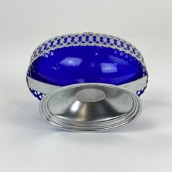 Ovalus mėlyno stiklo indas metaliniame stove 8×12,5×7,5 cm