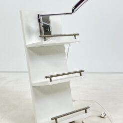 Pakabinama baltos spalvos lentyna su apšvietimu 17x36x70 cm