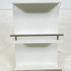 Pakabinama baltos spalvos lentyna su apšvietimu 17x36x70 cm