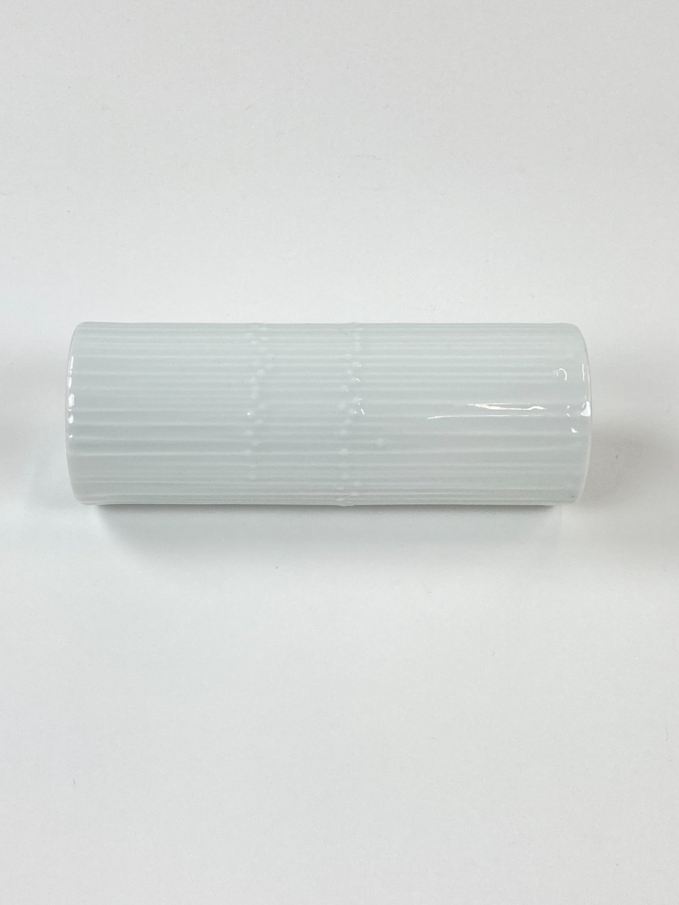 HN1162-rosenthal-4 Porcelianinė “Rosenthal” cilindro formos vaza 6x6x16,5 cm