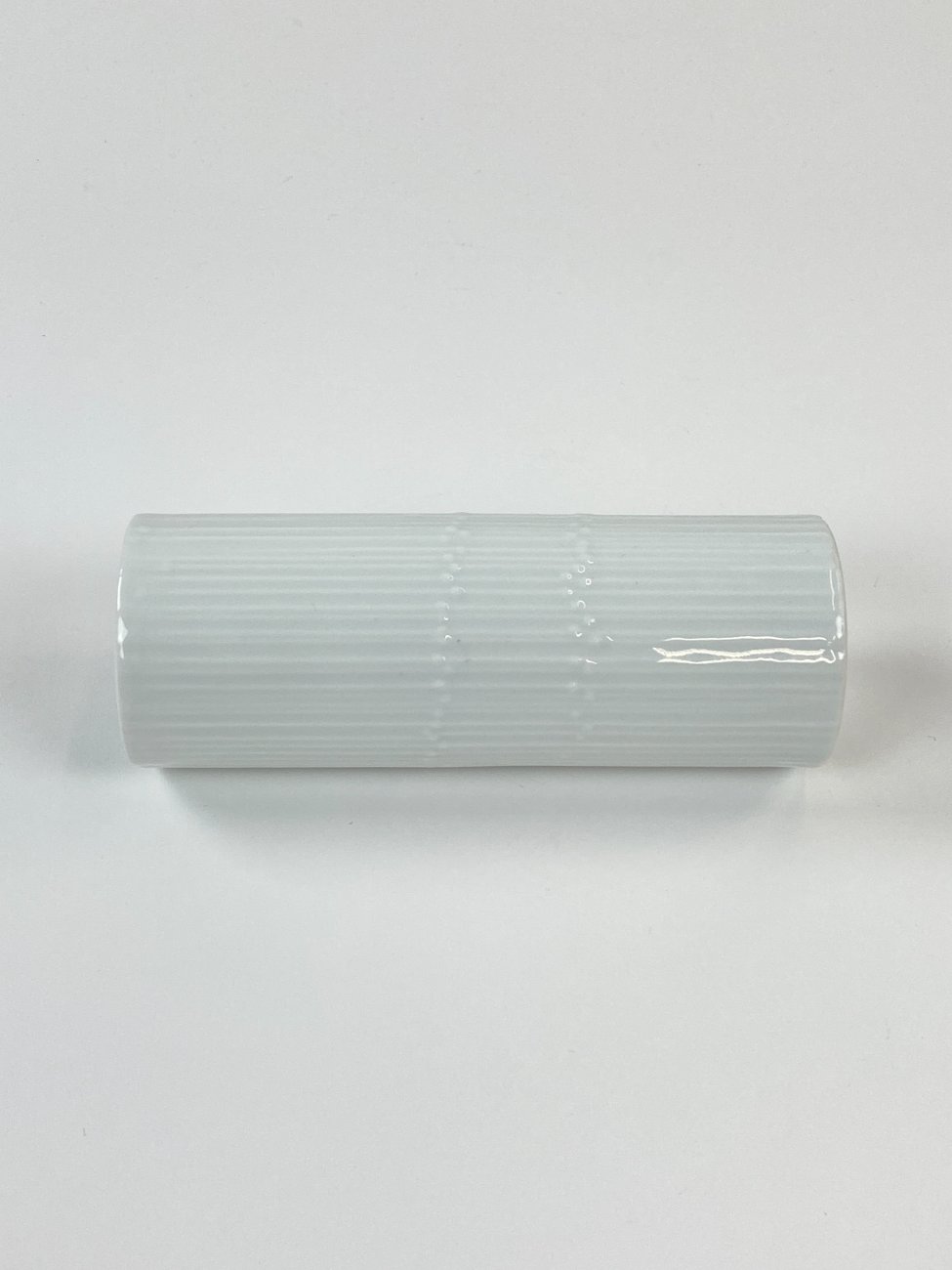 HN1162-rosenthal-5 Porcelianinė “Rosenthal” cilindro formos vaza 6x6x16,5 cm