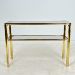 Auksinės spalvos metalinio rėmo konsolė su stiklu 43x121x86 cm