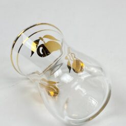 Stiklinė stiklinaitė su aukso spalvos obuolių atvaizdais 90 ml 5x5x7,5 cm