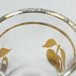 Stiklinė stiklinaitė su aukso spalvos obuolių atvaizdais 90 ml 5x5x7,5 cm