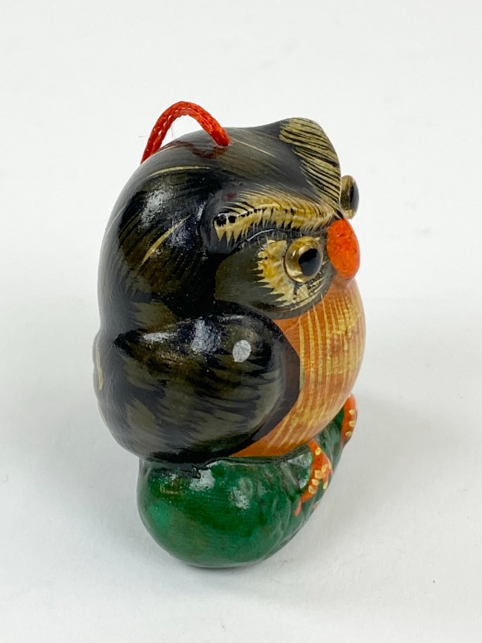 HN1535-keramikines-skulpturos-3 Keramikinė pakabinama apuoko figūra 3×4,5×4,5 cm