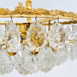 Pakabinamas Schröder and Co žalvario ir krištolo sietynas 42x42x65 cm