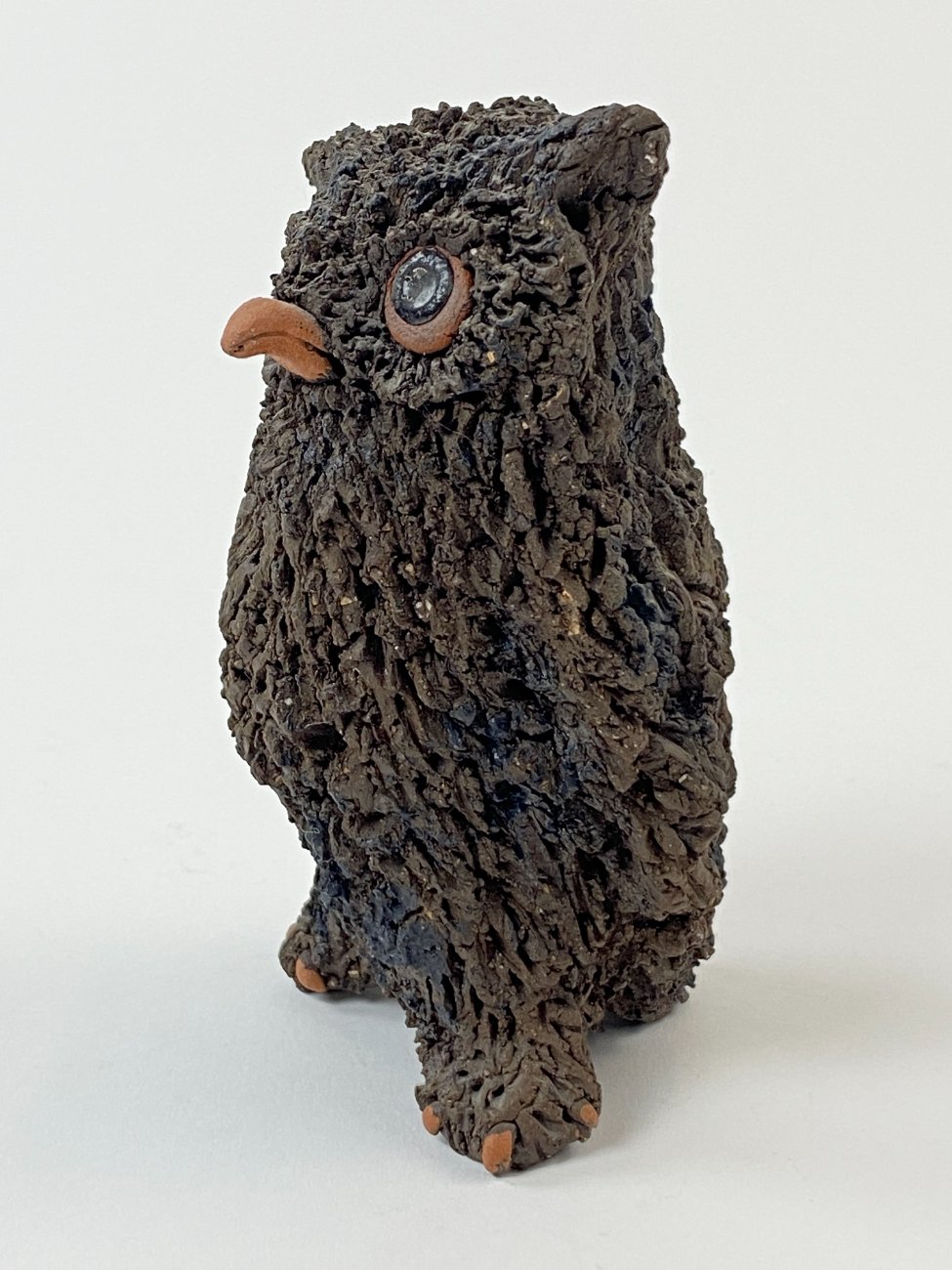 HN1569-keramikines-skulpturos-4 Molinė apuoko statula 6,5x7x11,5 cm