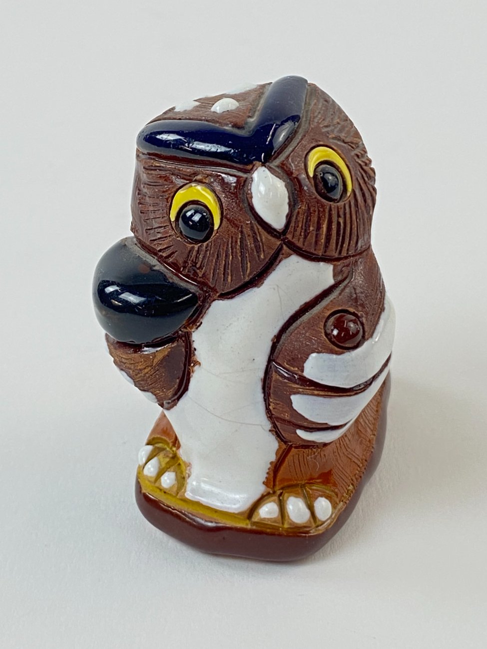 HN1571-keramikines-skulpturos-1 Molinė apuoko statula su glazūra 5x4x5,5 cm