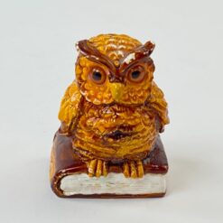 Keramikinė apuoko statula ant knygos 5,5x4x6 cm