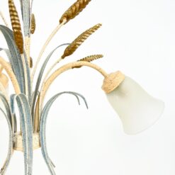 Metalinis pakabinamas augalų motyvų trijų šakų sietynas 56x56x77 cm