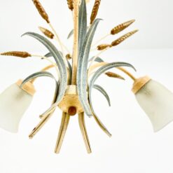 Metalinis pakabinamas augalų motyvų trijų šakų sietynas 56x56x77 cm