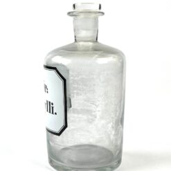 Vintažinis stiklinis medicininis butelys – grafinas “Spir Serpylli” 8,5×8,5×17 cm