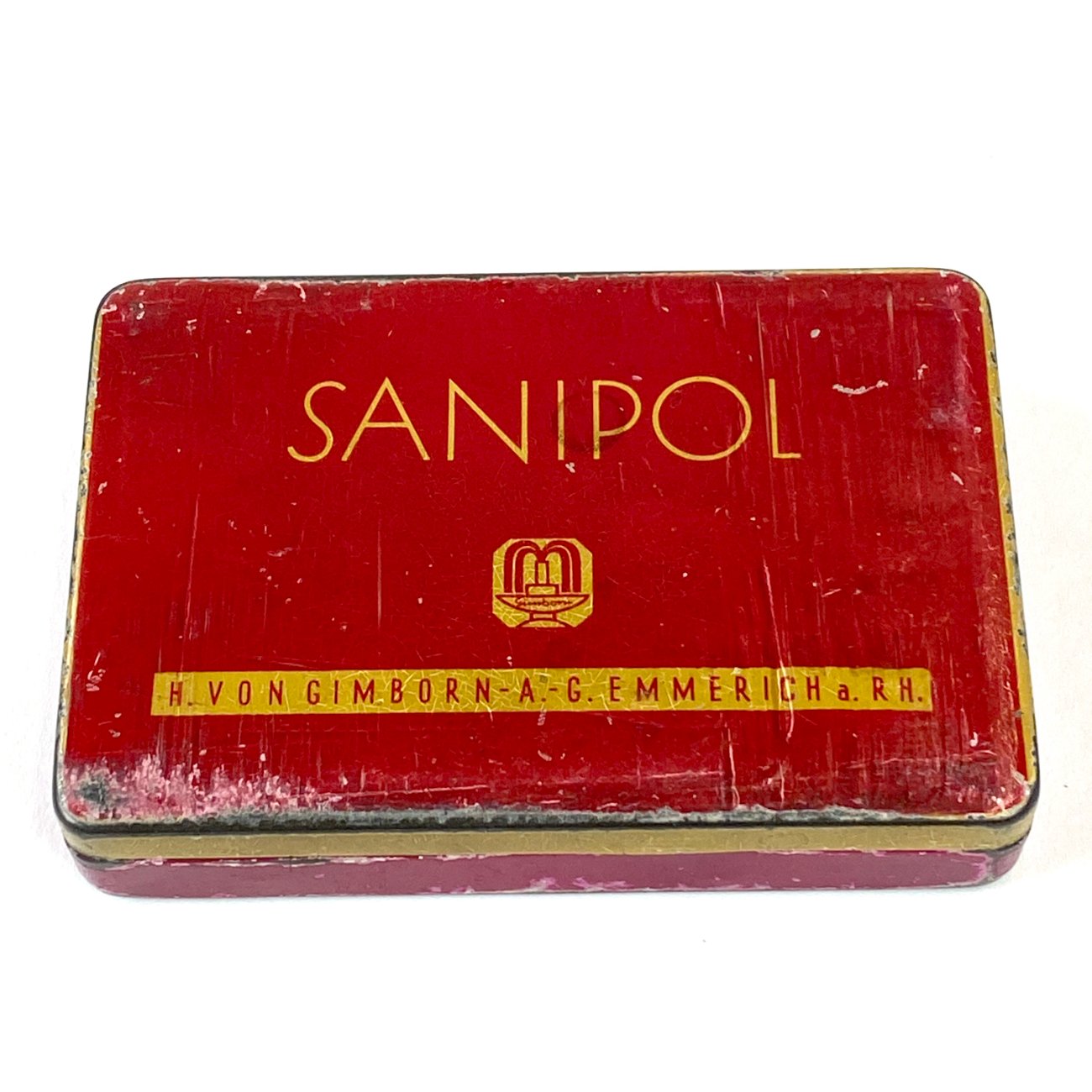 HN1931-kiti-indai-0 Vintažinė skardinė vaistų dėžutė “Sanipol” 7×10,5×2 cm