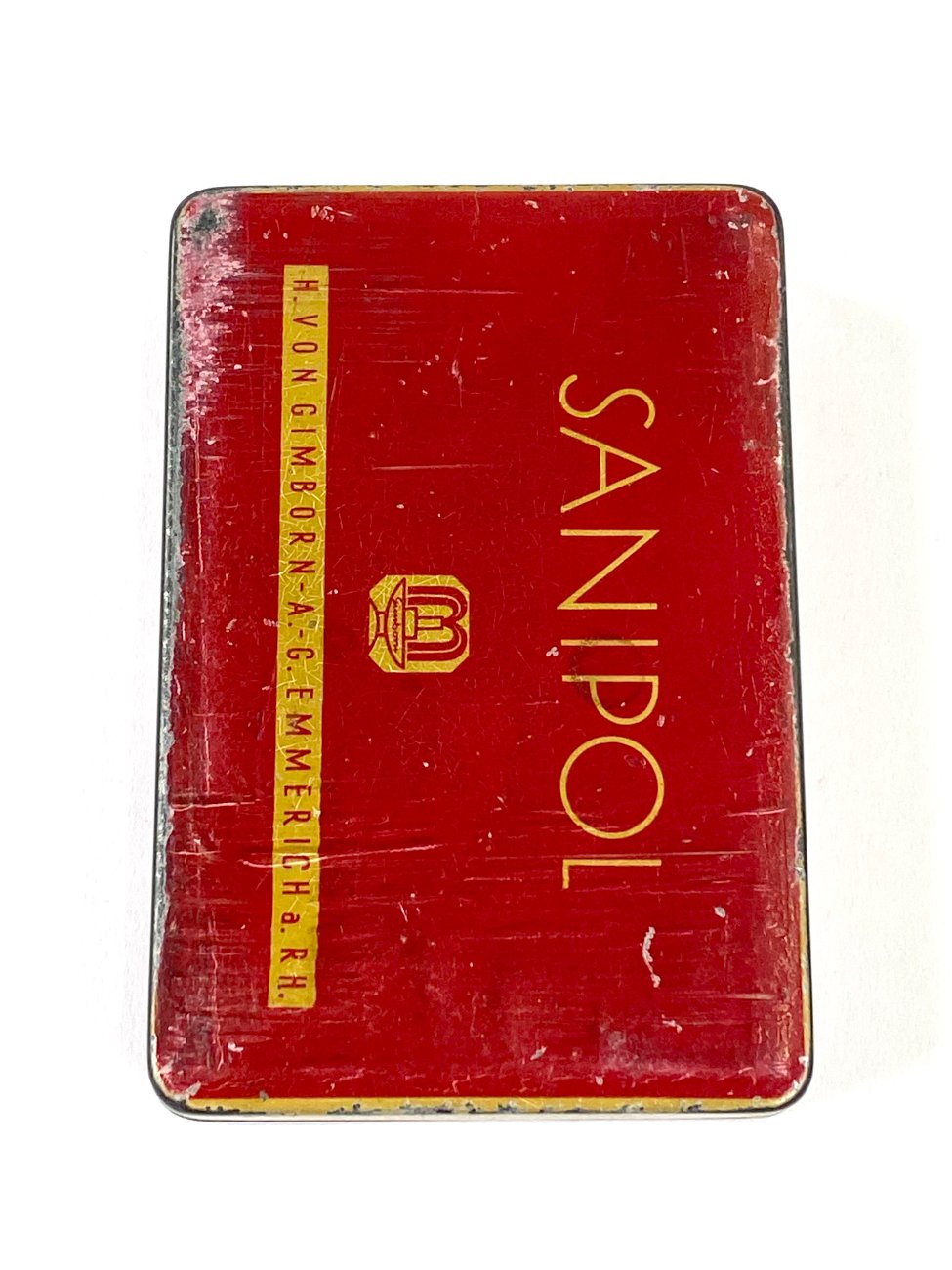 HN1931-kiti-indai-4 Vintažinė skardinė vaistų dėžutė “Sanipol” 7×10,5×2 cm