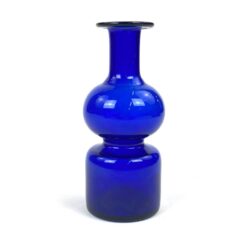 Mėlynos spalvos stiklo vaza 7x7x17 cm