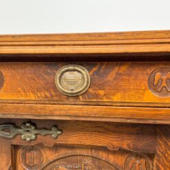 Ąžuolinė jūriniais motyvais drožinėta komoda 45x103x68 cm